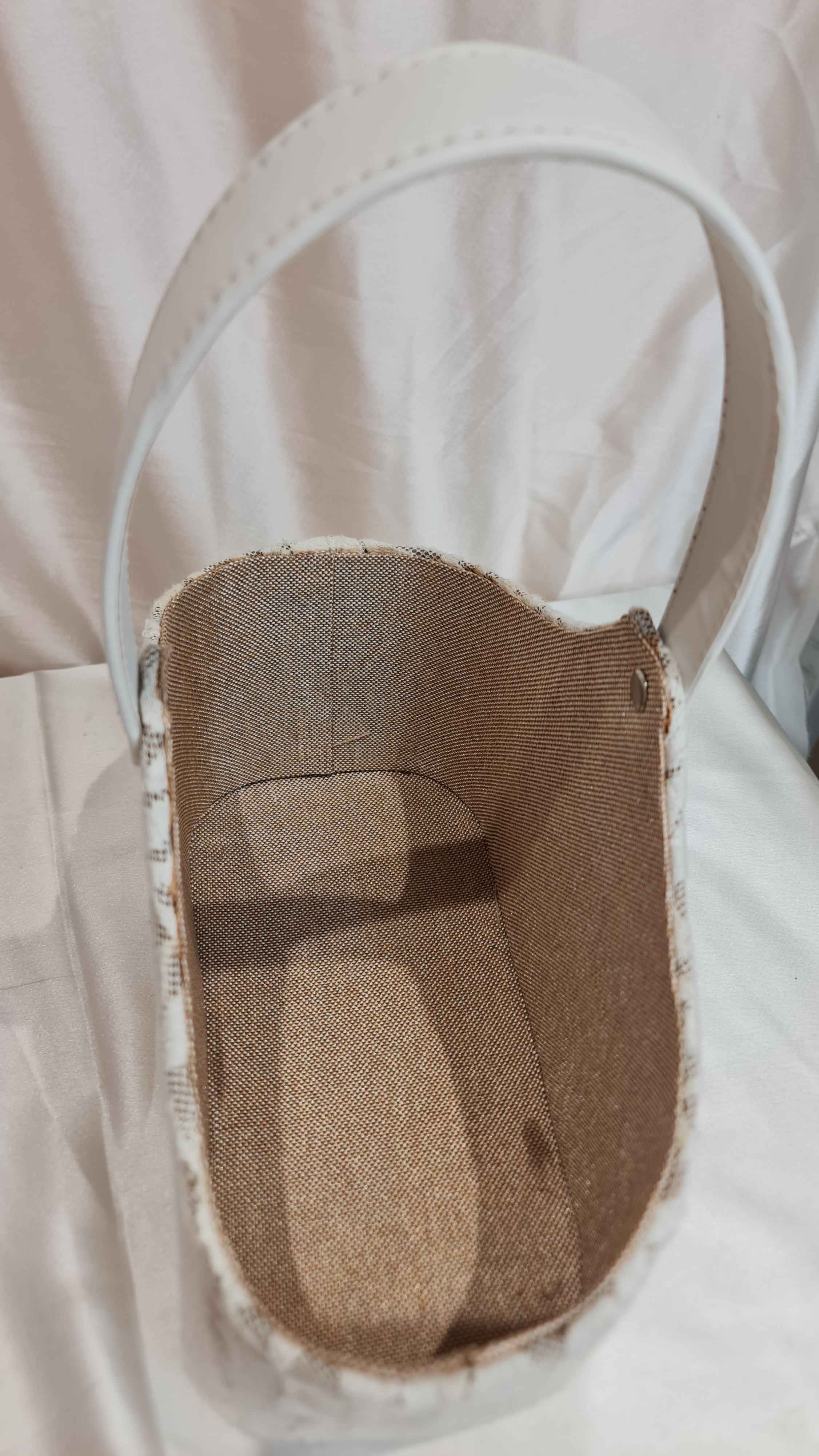 Close-up of a brown sandal sole on a white background