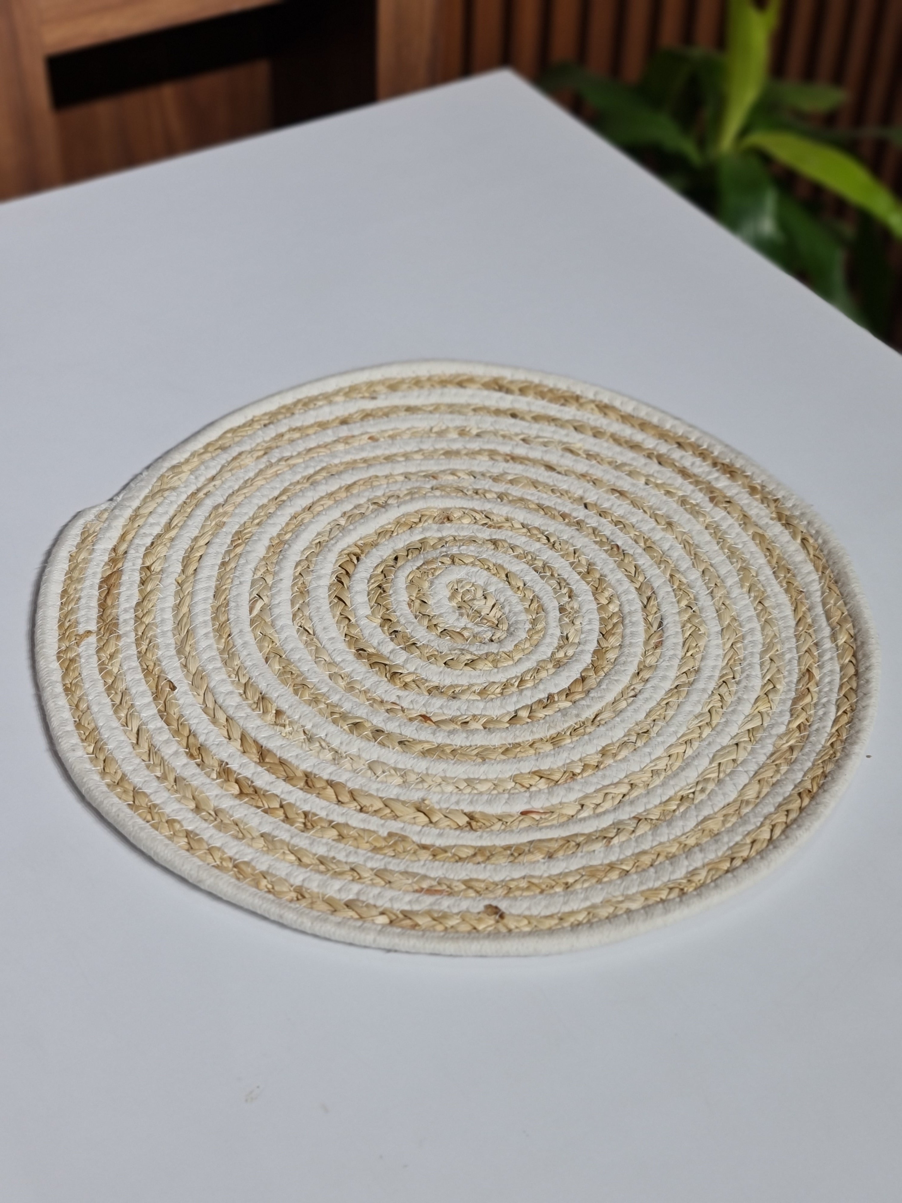 Decorative wall art with concentric circular pattern on a white background