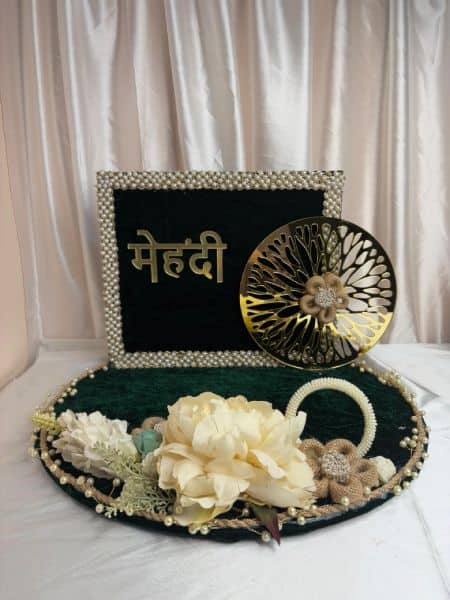 Decorative items for Mehndi ceremony on a white background